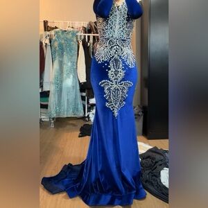 Royal Blue long sleeve gown with long train